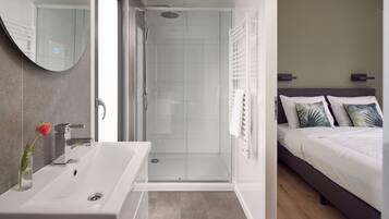 Shower, rainfall showerhead, toilet paper