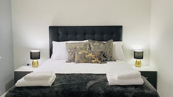 4 bedrooms, desk, iron/ironing board, travel cot