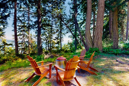 Water-view home with large deck, firepit, grill, & W/D
