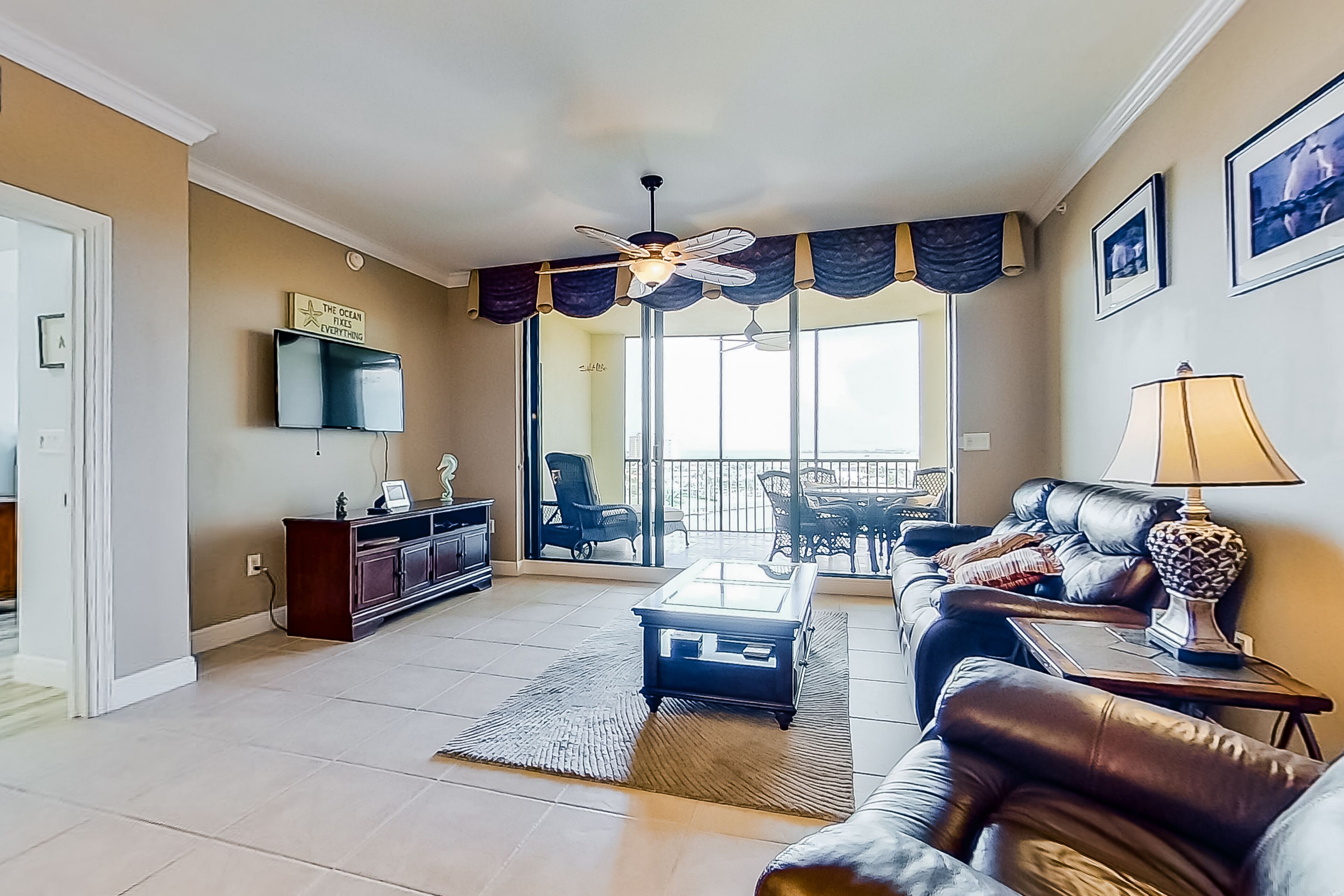 Beautiful water-view condo with pools, gym, hot tub, 2 balconies, washer/dryer