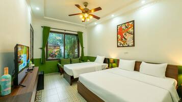Deluxe Triple Room | Premium bedding, minibar, desk, blackout drapes