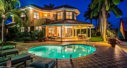 A luxurious beachfront villa with private beach on a calm lagoon. Montego Bay JA