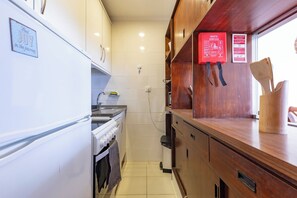 Apartment | Private kitchen | Full-sized fridge, microwave, oven, stovetop
