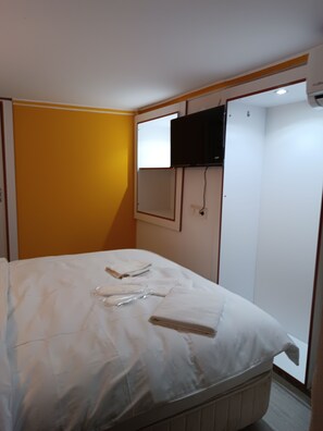 Quartos à prova de som, Wi-Fi de cortesia, roupa de cama