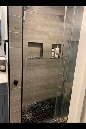 Hair dryer, towels, soap, shampoo