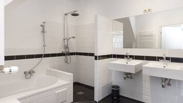 Shower, jetted bath, towels, soap