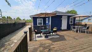 A deck with outdoor furniture, a pergola, and string lights. - ~ Houston Heights 4-plex with patio ~ (Houston)