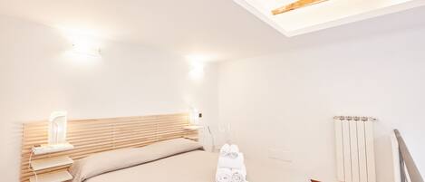 1 dormitorio, tabla de planchar con plancha, wifi gratis y ropa de cama