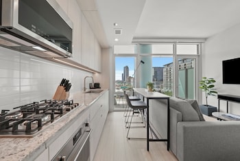 Fridge, microwave, oven, stovetop at Level Chicago Fulton Market