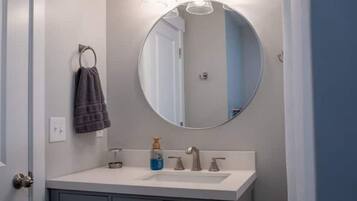 Hair dryer, towels, soap, shampoo