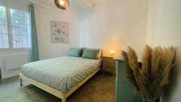 2 dormitorios, cuna de viaje, wifi gratis y ropa de cama