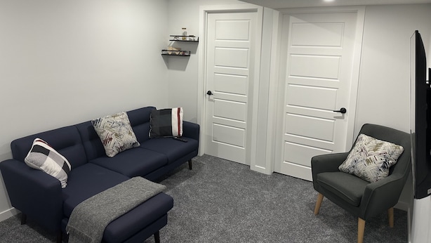 Living area - Serene Basement in a Townhome - private room with wifi access (Calgary)
