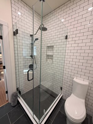 Shower, hair dryer, towels, soap