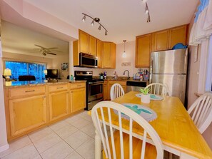 Fridge, microwave, oven, stovetop - Bridget's Beach Retreat, On the beach with views on balcony,bedroom,living room (New Smyrna Beach)
