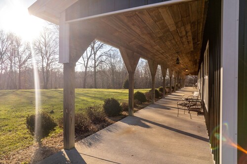 Historic 1830s Log Cabin nestled in the woods only 5 minutes from Madison, IN