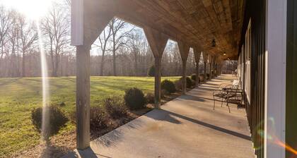 Historic 1830s Log Cabin nestled in the woods only 5 minutes from Madison, IN