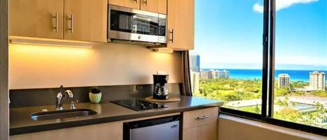 Fridge, microwave, stovetop, coffee/tea maker