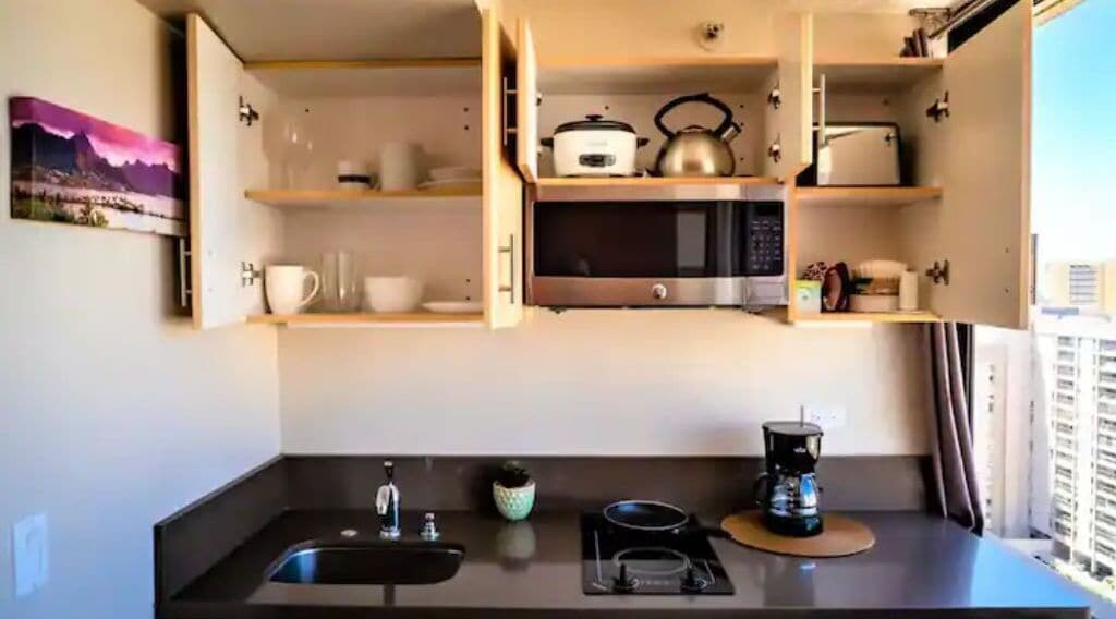 Fridge, microwave, stovetop, coffee/tea maker