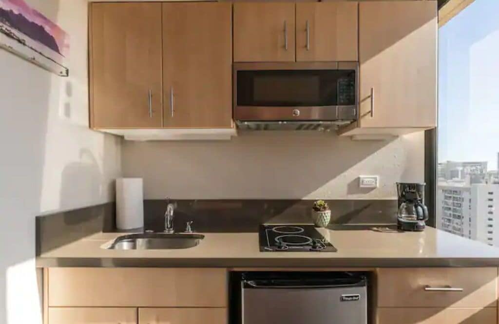 Fridge, microwave, stovetop, coffee/tea maker