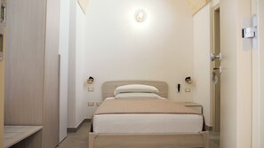 Habitación exclusiva | Sábanas de algodón egipcio y ropa de cama de alta calidad