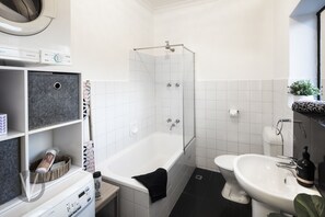 Hair dryer, towels, soap, toilet paper