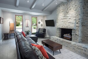 House, Multiple Beds, Patio | Living area | TV, fireplace - Mid-century Home 3blk to Mainst (Fredericksburg)