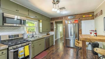 House, Multiple Beds, Hot Tub (413 W San Ant River) | Private kitchen | Fridge, microwave, oven, stovetop
