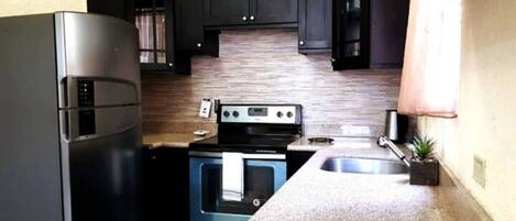 Fridge, oven, stovetop, electric kettle