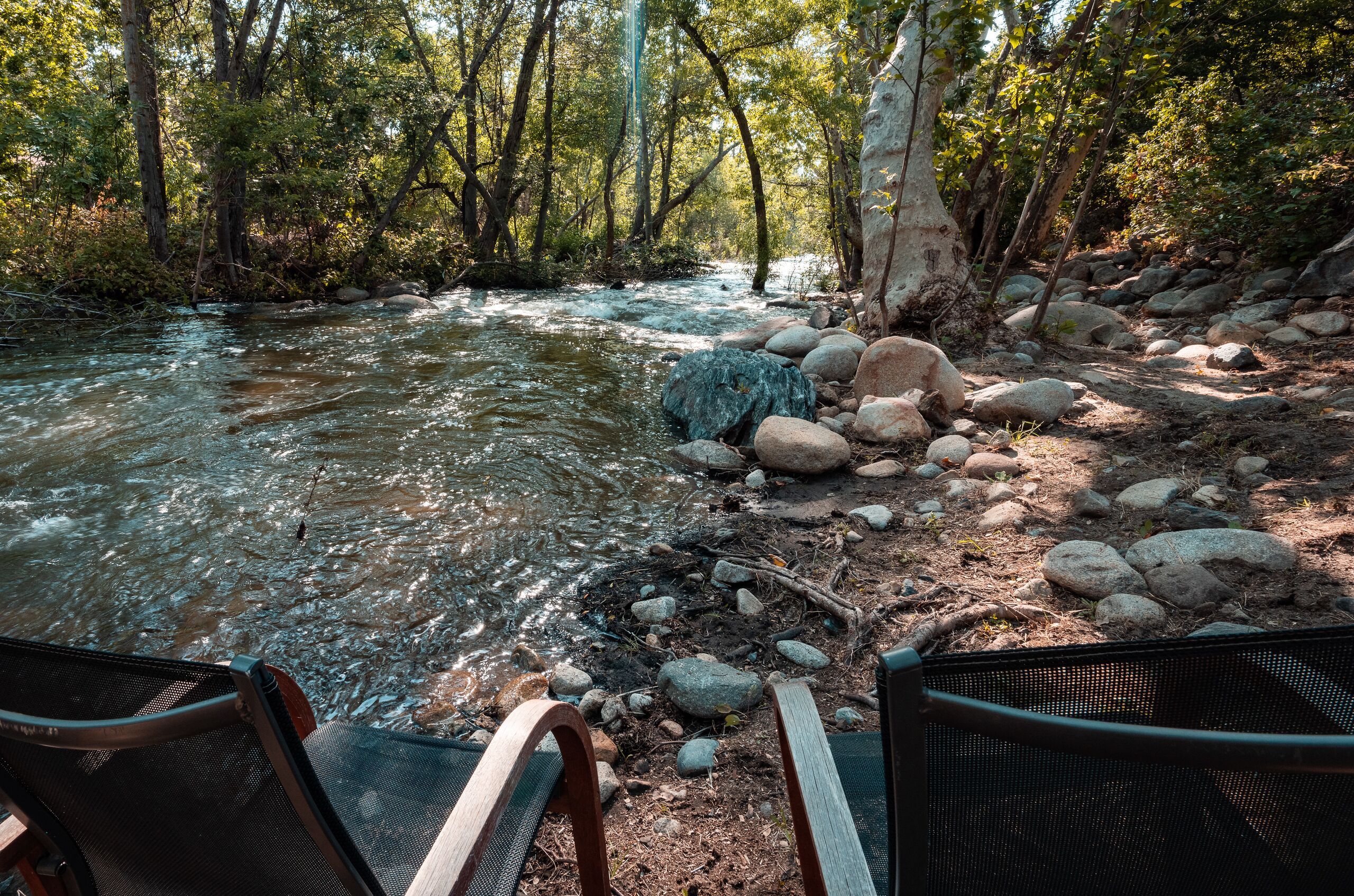 Beautiful Riverfront Home on 4 acres with 360 privacy and amazing swimming holes