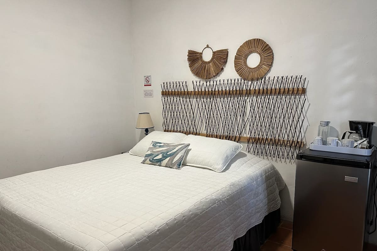 Comfort Single Room, 1 Queen Bed, Private Bathroom, Beach View | Down duvets, in-room safe, blackout curtains, free WiFi