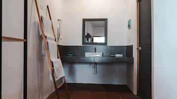 Shower, free toiletries, towels, toilet paper