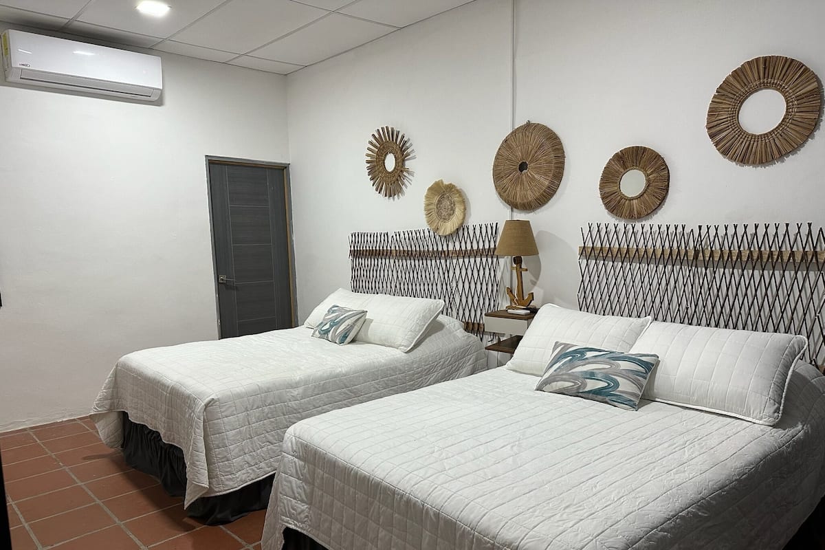 Comfort Double Room, 2 Double Beds, Private Bathroom, Beach View | Down duvets, in-room safe, blackout curtains, free WiFi