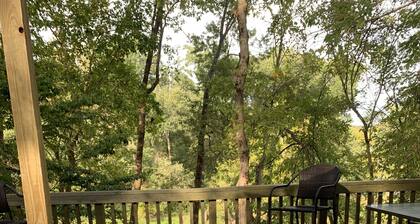 NOT-SO-ORDINARY TRAILER! A lovely getaway on The Little Red River with hot tub!