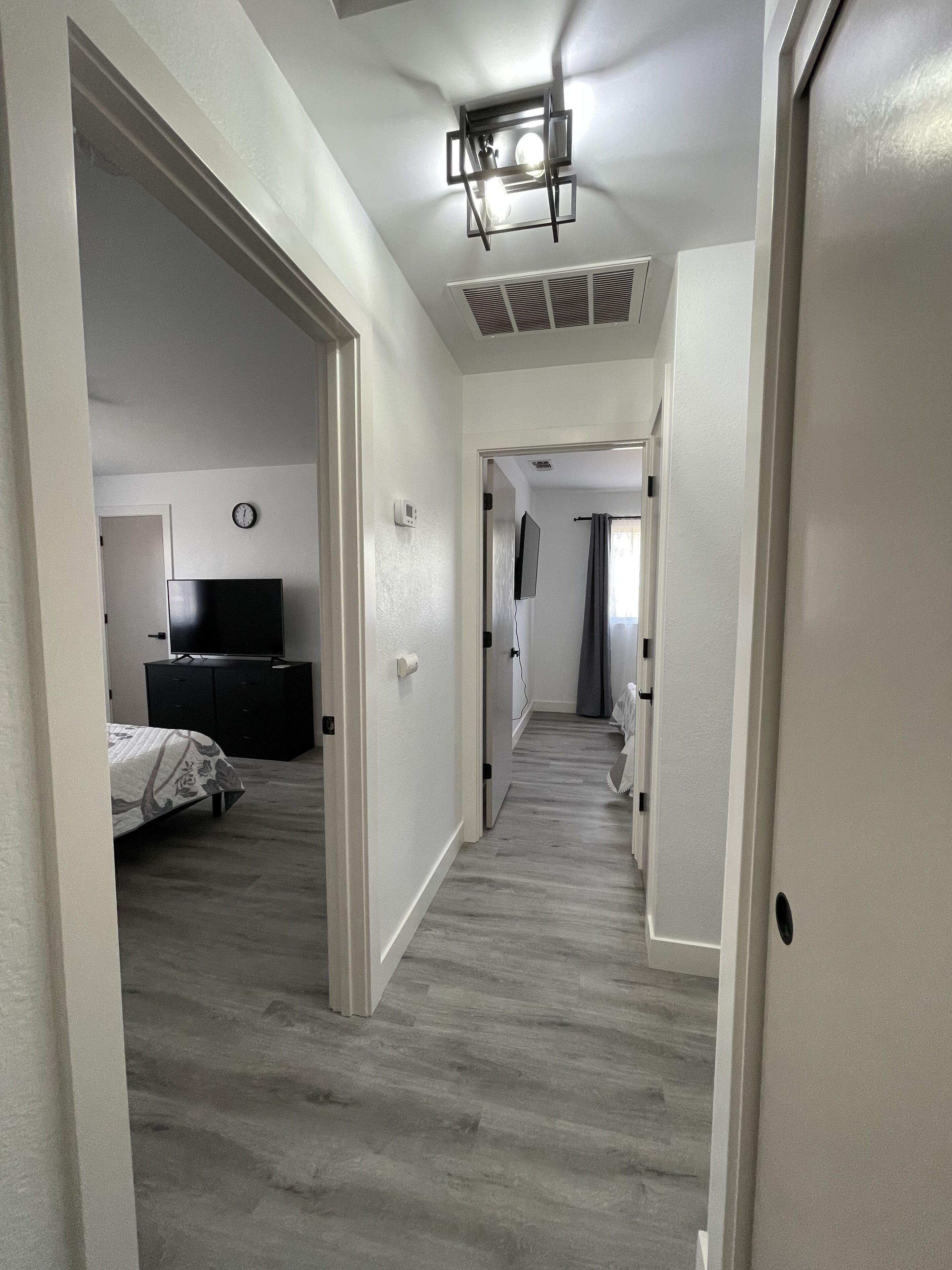 2 bedrooms, desk, iron/ironing board, travel crib