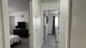 2 bedrooms, desk, iron/ironing board, travel crib