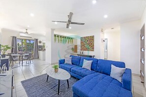 Comfort Apartment | Living area | Smart TV, Netflix, streaming services - Zen by the Coast - 2 BR Cozy Apartment (Brinkin)