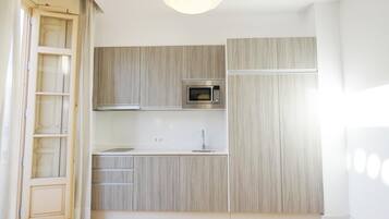 Fridge, microwave, coffee/tea maker, toaster
