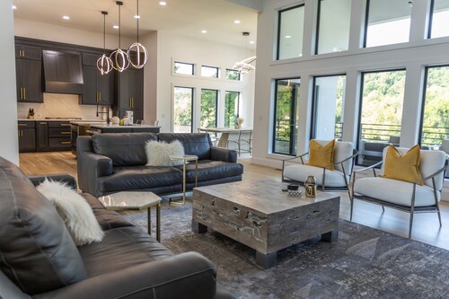 Modern Waterfront Mansion with Private Dock, kayak, paddle board and ping pong  
