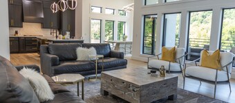Modern Waterfront Mansion with Private Dock, kayak, paddle board and ping pong  