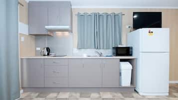 Standard Twin Cabin 16,17, Queen bed with 1 Single Bed | Private kitchen | Full-size fridge, microwave, electric kettle, cleaning supplies