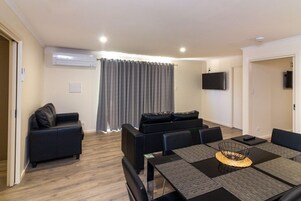 Deluxe 3 Bedroom Cabin 19 | Living area | Flat-screen TV