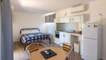 Standard Family Cabin 1,2,3. Queen Bed with 2 Single Beds | Individually decorated, individually furnished, desk, laptop workspace
