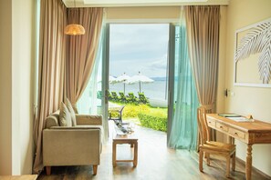 Villa Deluxe, frente a la playa | 1 dormitorio, minibar (con algunos artículos gratuitos), caja fuerte