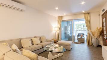 21-inch TV with cable channels, video game console