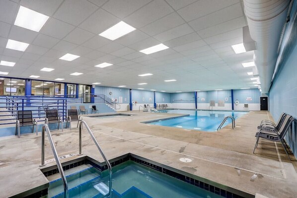 An indoor swimming pool with multiple lanes, a diving area, and a spectator deck. - Grace-Jo @ Tamarack Highland 5 (Wisconsin Dells)