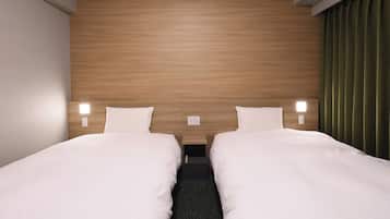 Basic Twin Room, Non Smoking | Down comforters, memory foam beds, in-room safe, desk