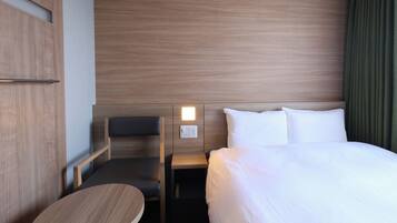 Basic Double Room, Non Smoking | Down comforters, memory foam beds, in-room safe, desk