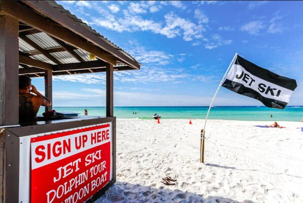 On the beach, sun loungers, beach towels