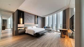 Luxe beddengoed, donsdekens, een minibar, een kluis op de kamer
