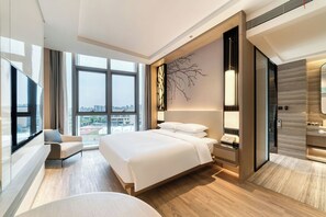 Premium bedding, down comforters, minibar, in-room safe